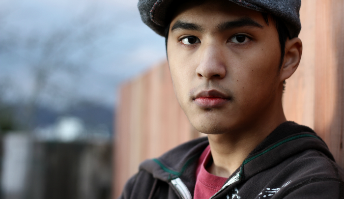 Teen boy looking forward