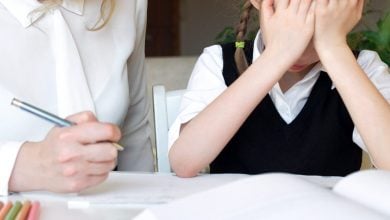 Parent helping child with homework and child is frustrated